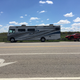 Illustration for article titled How This Big Ass RV Helped Us Sling A $240,000 Supercar Around A Dirt Track